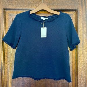 Green envelope navy top